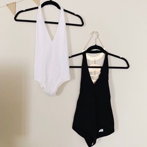 White and black small American apparel bodysuits